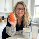 Woman choosing STEADY Electrolyte Gummies over messy electrolyte powder